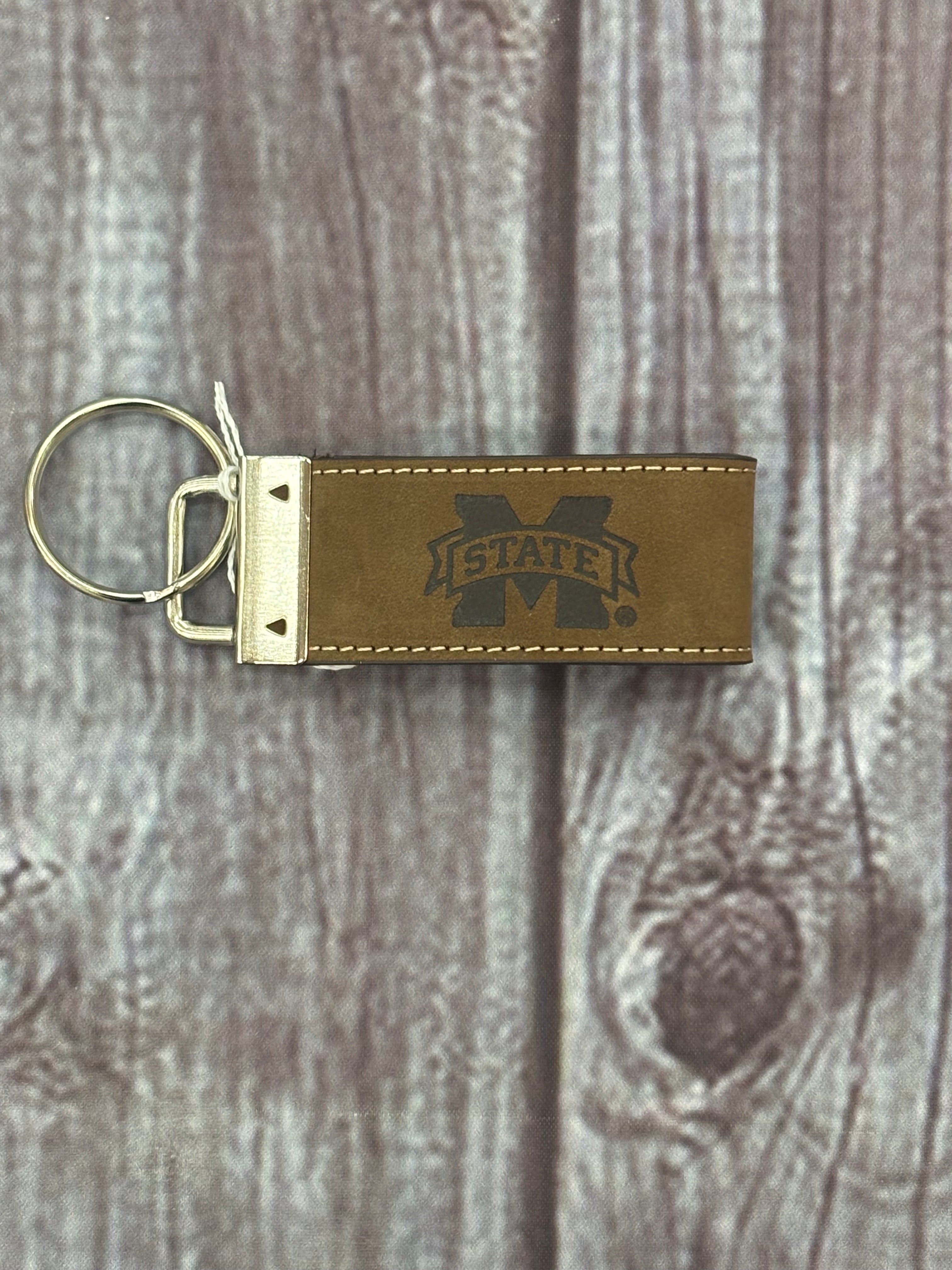 Divisions Of Zeppelin Products, Inc. Key Chain Fob Crazy Horse M-State Emblemossed