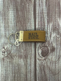 Divisions Of Zeppelin Products, Inc. Key Chain Fob Crazy Horse Hail State Emblemossed